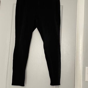 high rise non ripped black jeans and mid rise ripped blue jeans